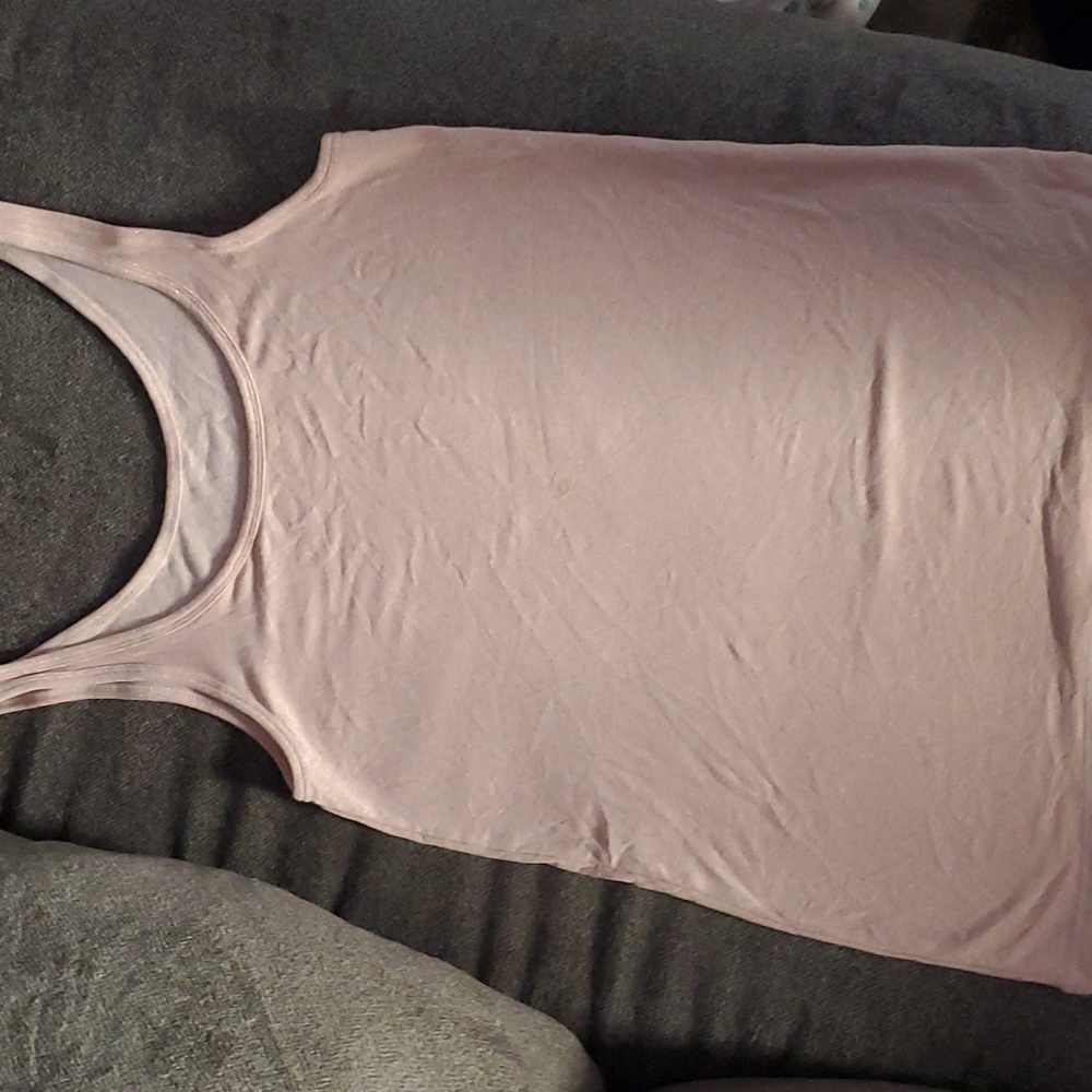 Beautiful light pink with metallic goldsparkle in it.